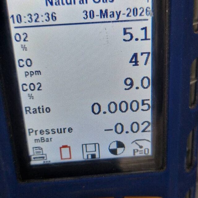 Flue gas analyser showing natural gas combustion readings during boiler commissioning, part of every Gas Safe boiler installation by Downs Plumbing & Heating